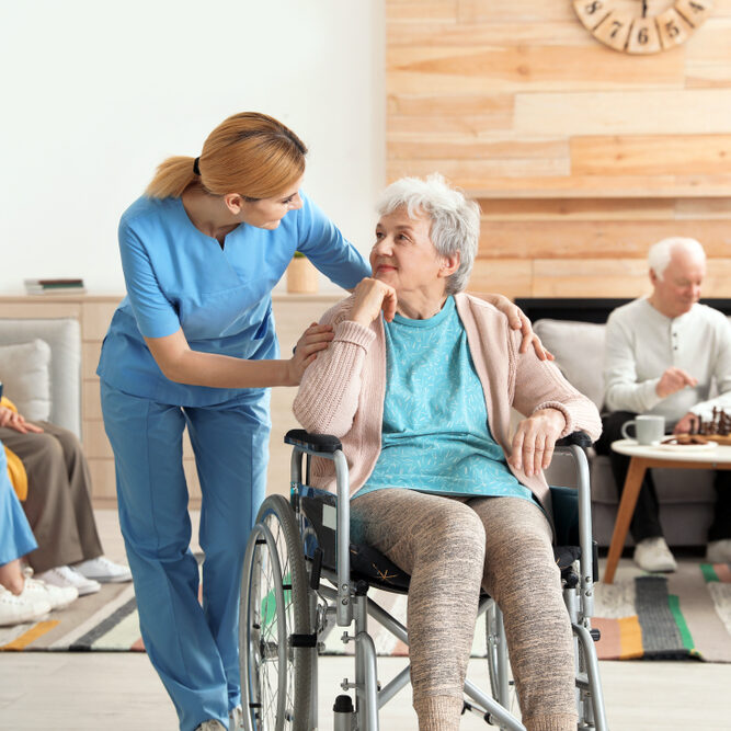Nurses,Assisting,Elderly,People,At,Retirement,Home